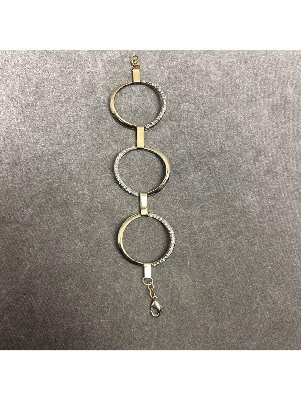 Guess gold-tone circular link crystal rhinestone bracelet
